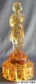 1920s-0518_8half_in_figure_flower_holder_(draped-lady)_amber.jpg