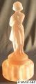 1920s-0518_8half_in_figure_flower_holder_(draped-lady)_frosted_peach-blo.jpg